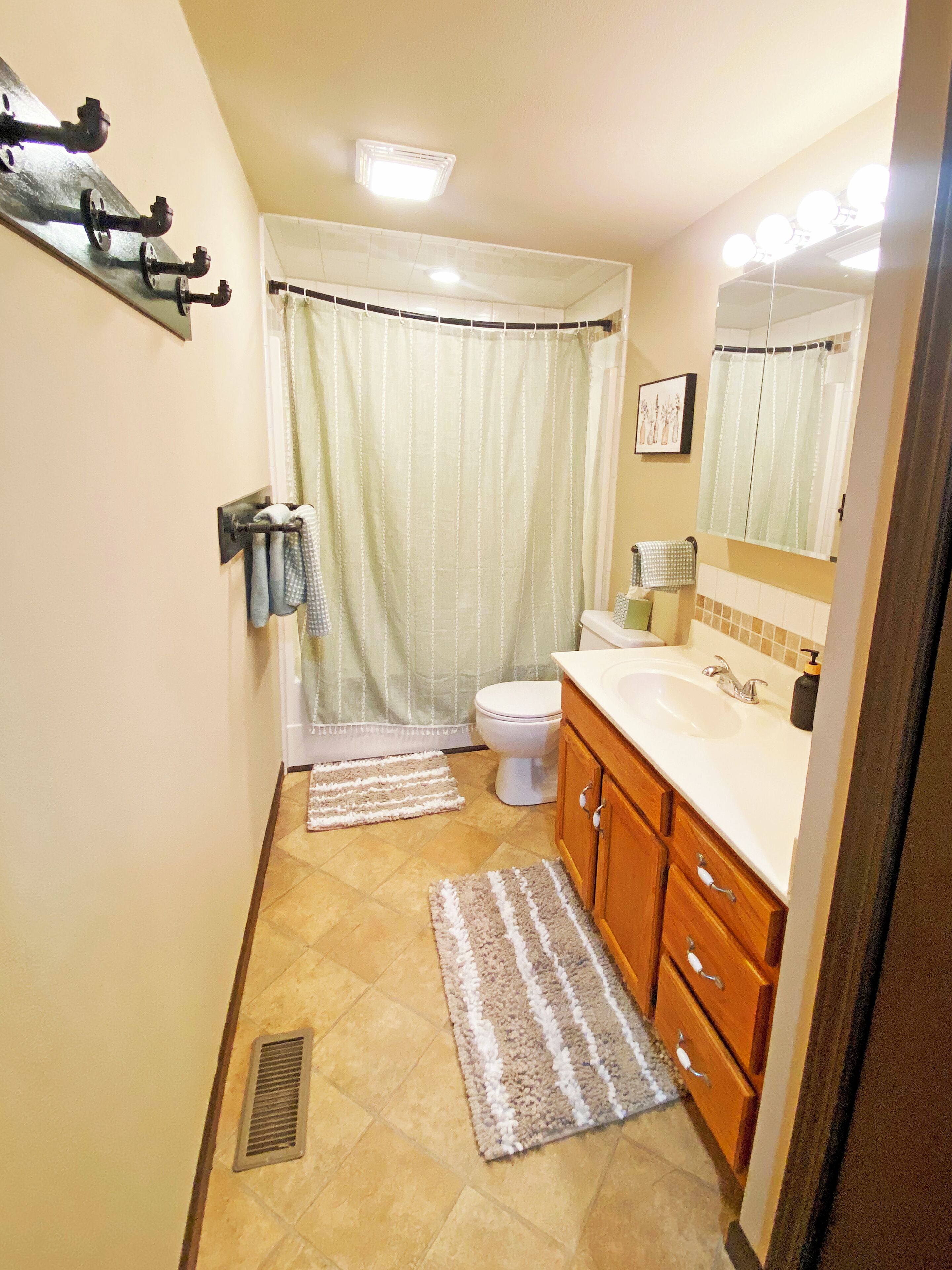 Shower, eco-friendly toiletries, hair dryer, towels