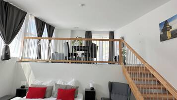 Premium bedding, memory foam beds, blackout drapes, soundproofing