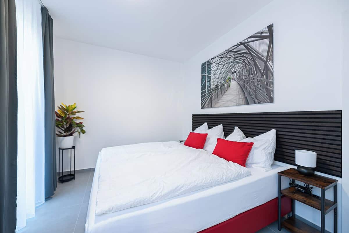 1 bedroom, premium bedding, memory-foam beds, blackout curtains