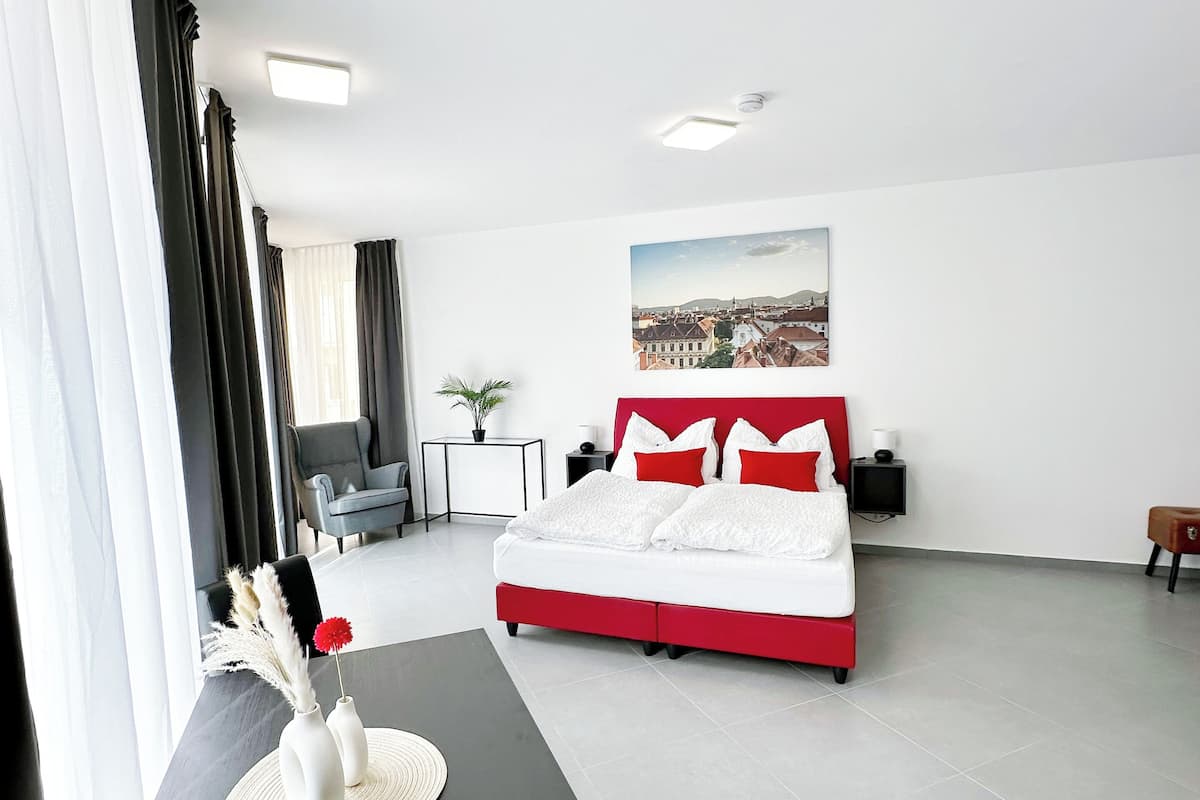 1 bedroom, premium bedding, memory-foam beds, blackout curtains