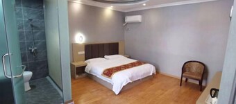 Huaiyuan Happy Holiday Hotel