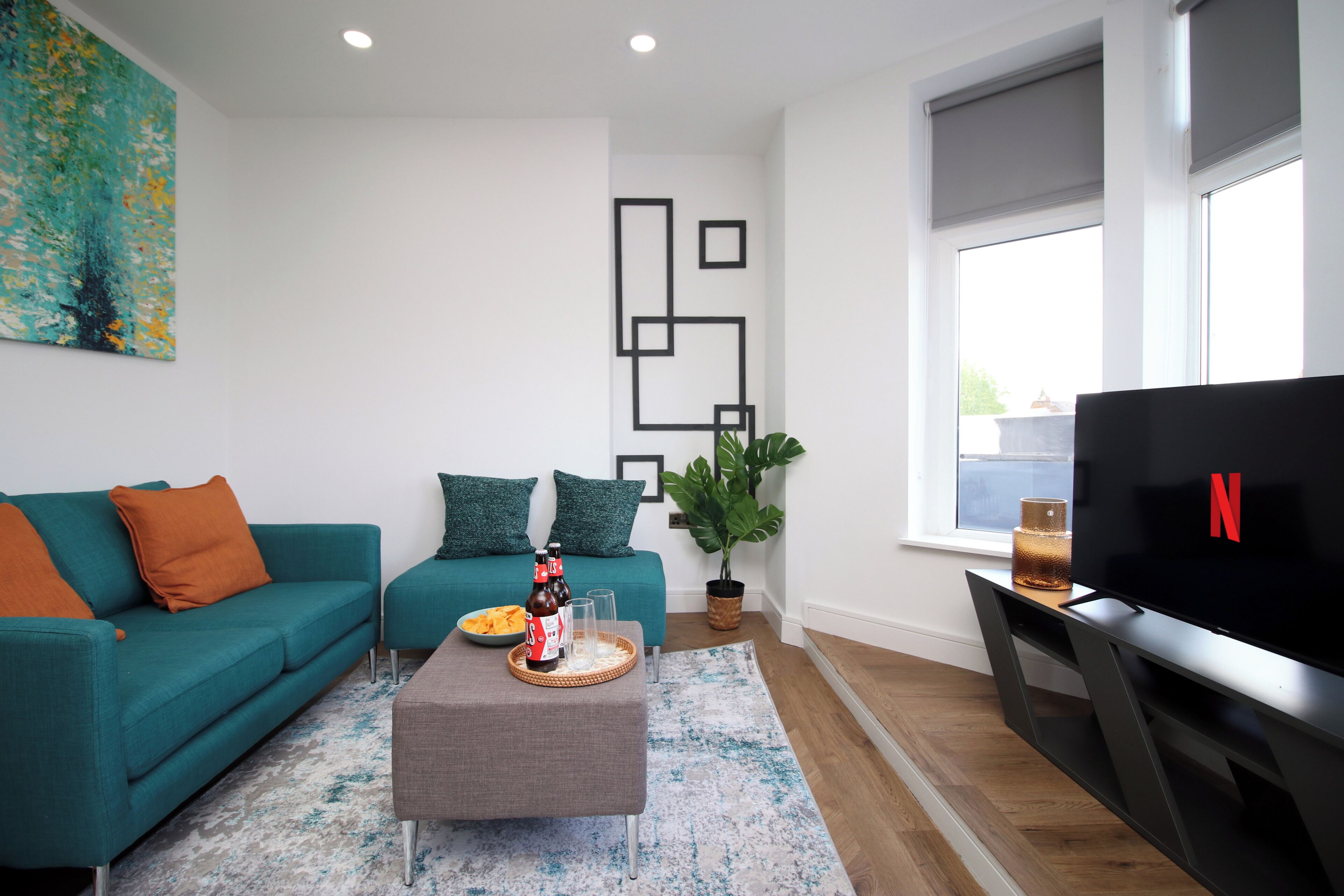 Deluxe Apartment | Living area | Smart TV