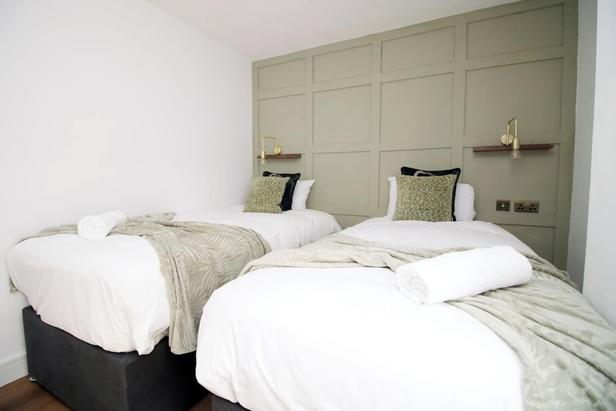 2 habitaciones, tabla de planchar con plancha y wifi gratis