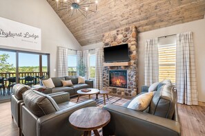 Älytelevisio, takka, pöytäjalkapallopöytä