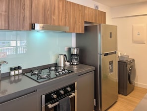 Apartment, 2 Bedrooms (603) | Private kitchen | Fridge, microwave, oven, coffee/tea maker