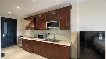 Standard Studio, City View | Private kitchen | Cleaning supplies, paper towels