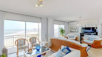 Apartment | Living area | 40-inch TV with satellite channels