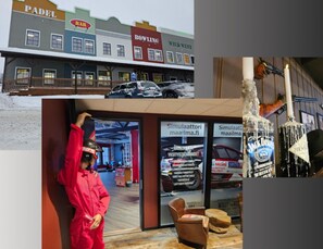 A storefront with a bowling alley, a bar, and a car dealership.