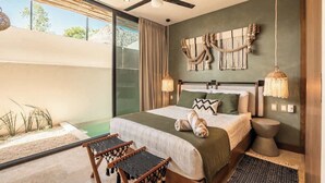 A bedroom with a bed, a ceiling fan, a large window, and a view of the outdoors. - Gem in the Jungle Private Pool Beach Club Access (Tulum)