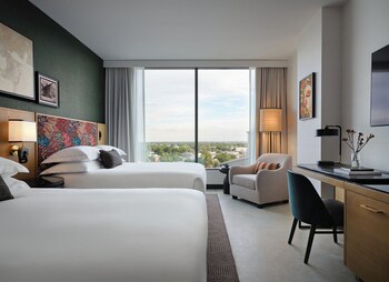 In-room safe, laptop workspace, blackout drapes, iron/ironing board at Kimpton Santo San Antonio - Riverwalk by IHG