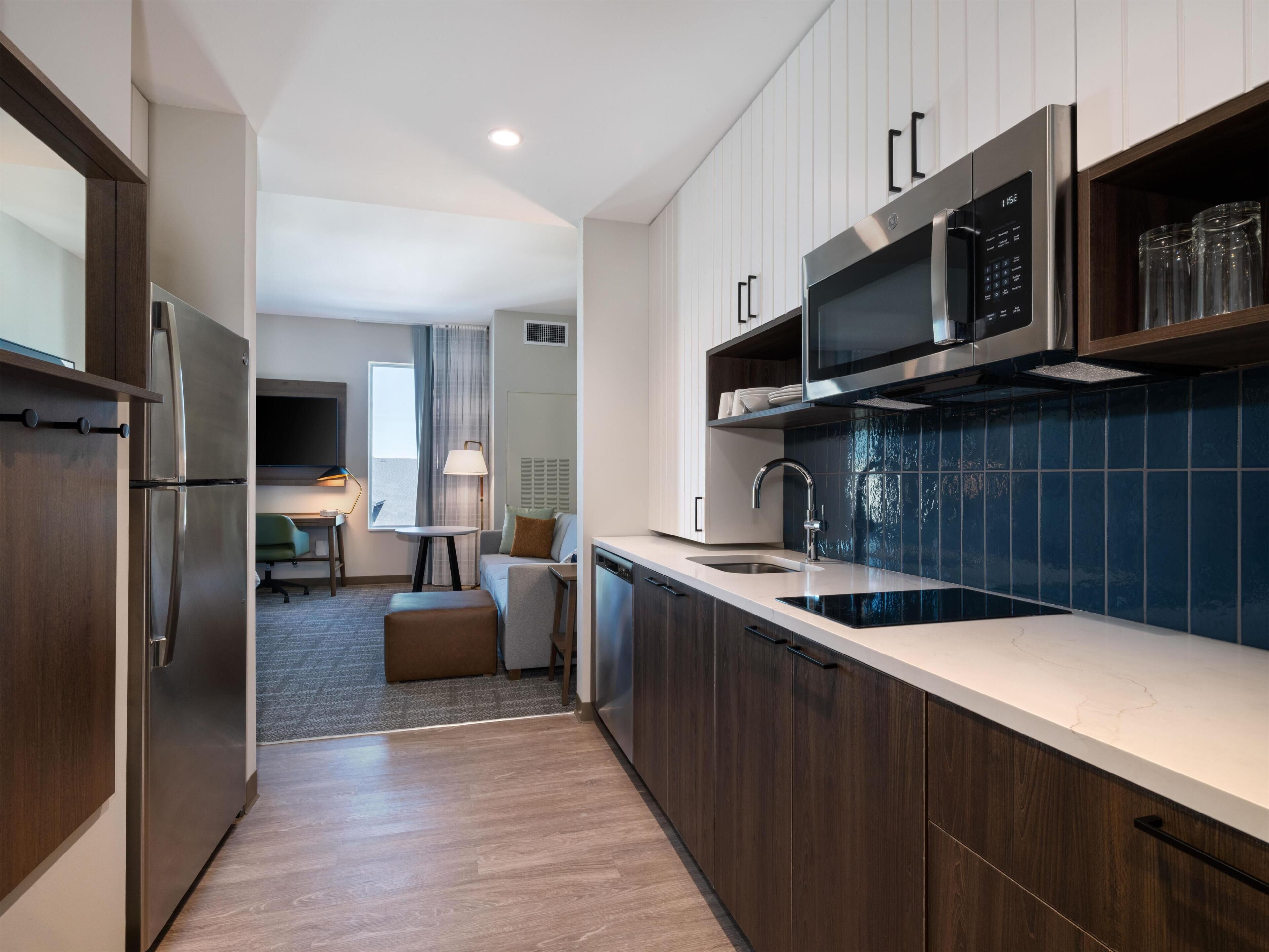 Full-sized fridge, microwave, stovetop, dishwasher