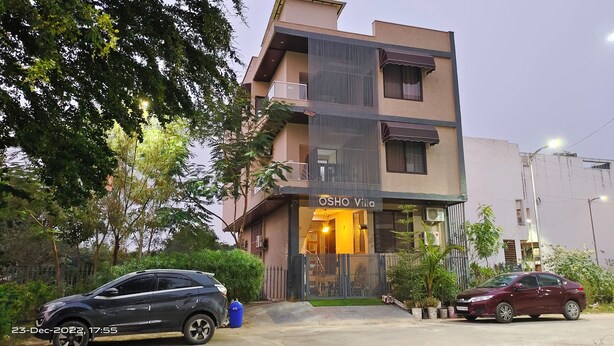 A modern two-story building with a visible entrance and a sign that reads "OSHO VITA". - OSHO Villa Homestay, 5 minutes to the Jaipur Airport, Garden View AC Rooms,  (Jaipur)