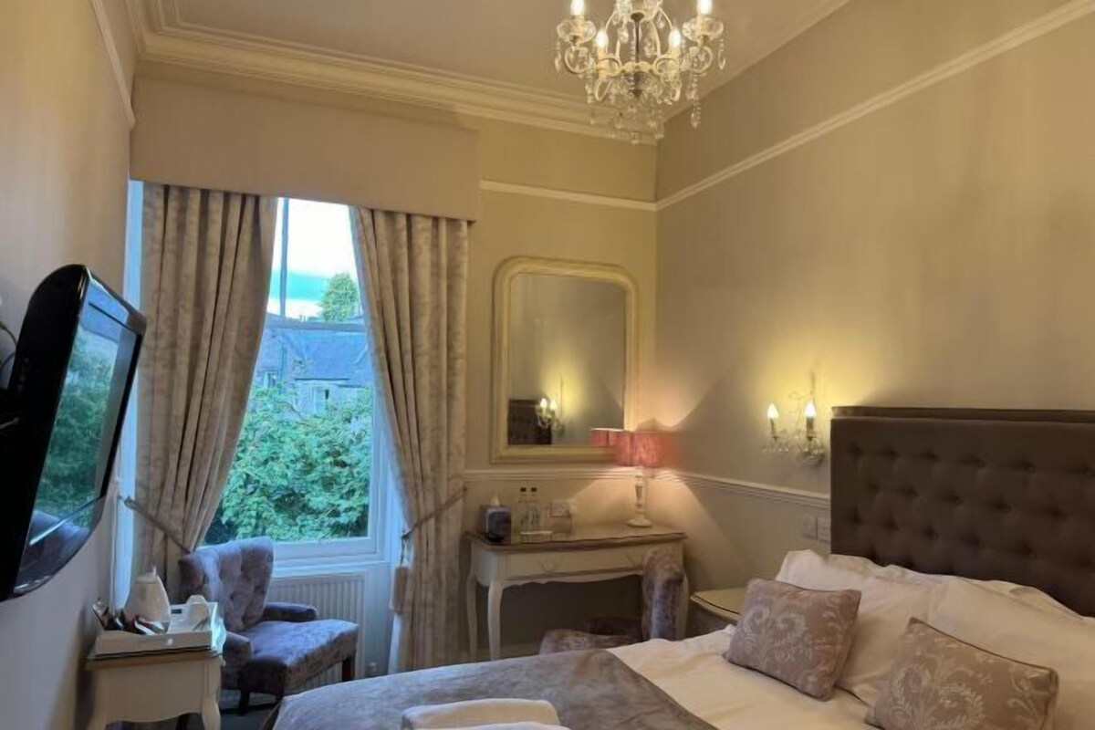 Blackout curtains, iron/ironing board (on request), bed sheets