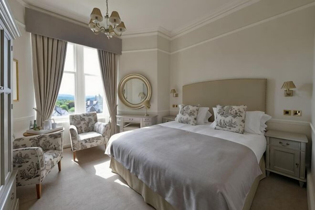 Blackout curtains, iron/ironing board (on request), bed sheets