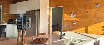 The Farmette on top of the hill, with great views, and friendly animals