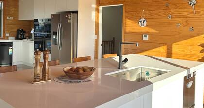 The Farmette on top of the hill, with great views, and friendly animals