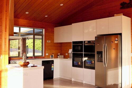 The Farmette on top of the hill, with great views, and friendly animals