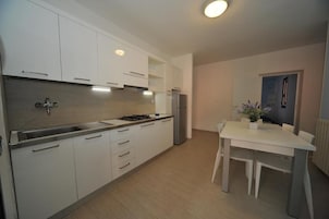 Appartamento Superior, vista giardino | Cucina privata
