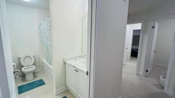 Shower, towels, soap, shampoo