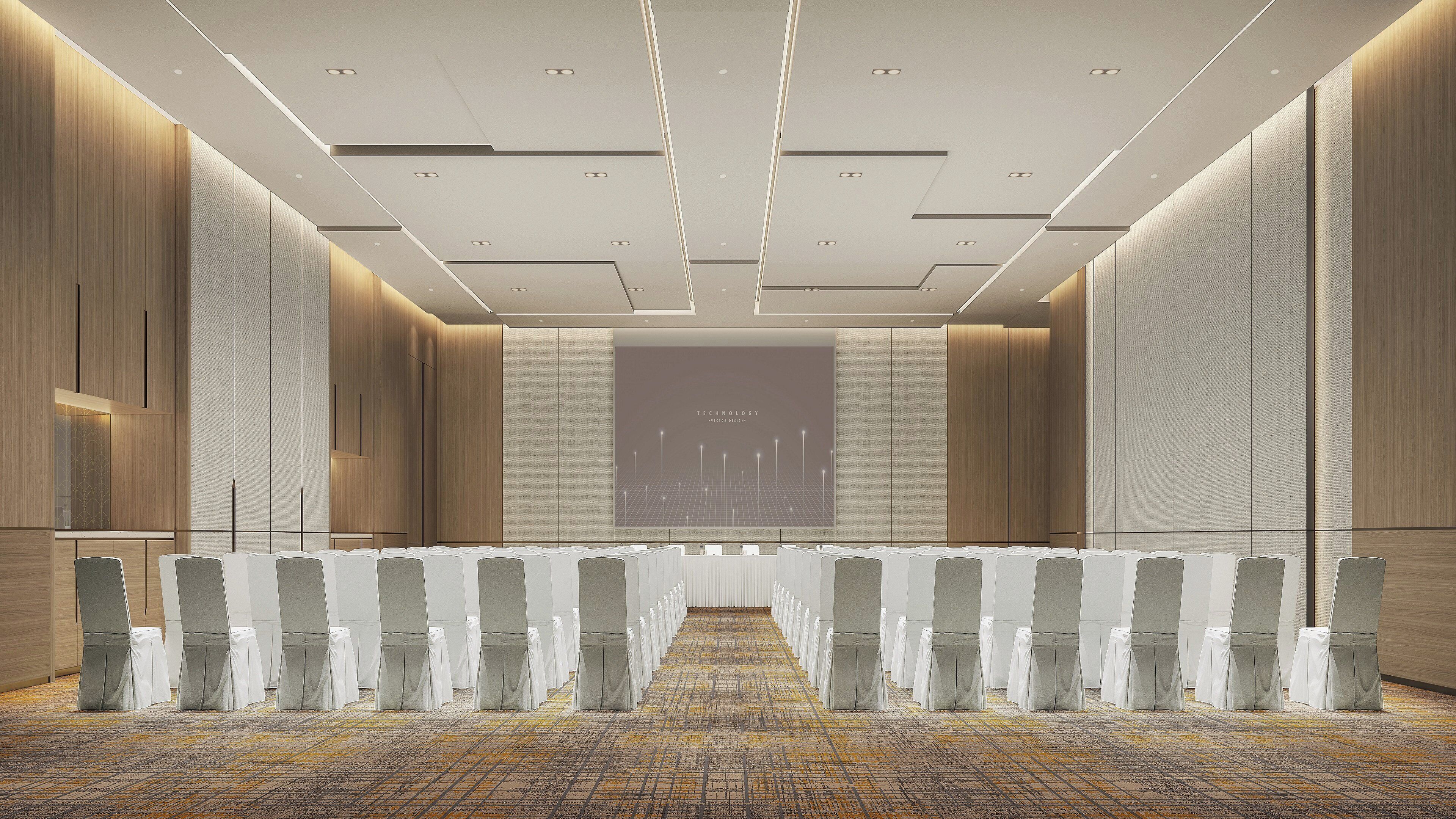 A conference room with a long table, chairs, and a projection screen.