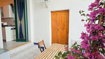 Appartement Deluxe, vue baie | Terrasse/Patio