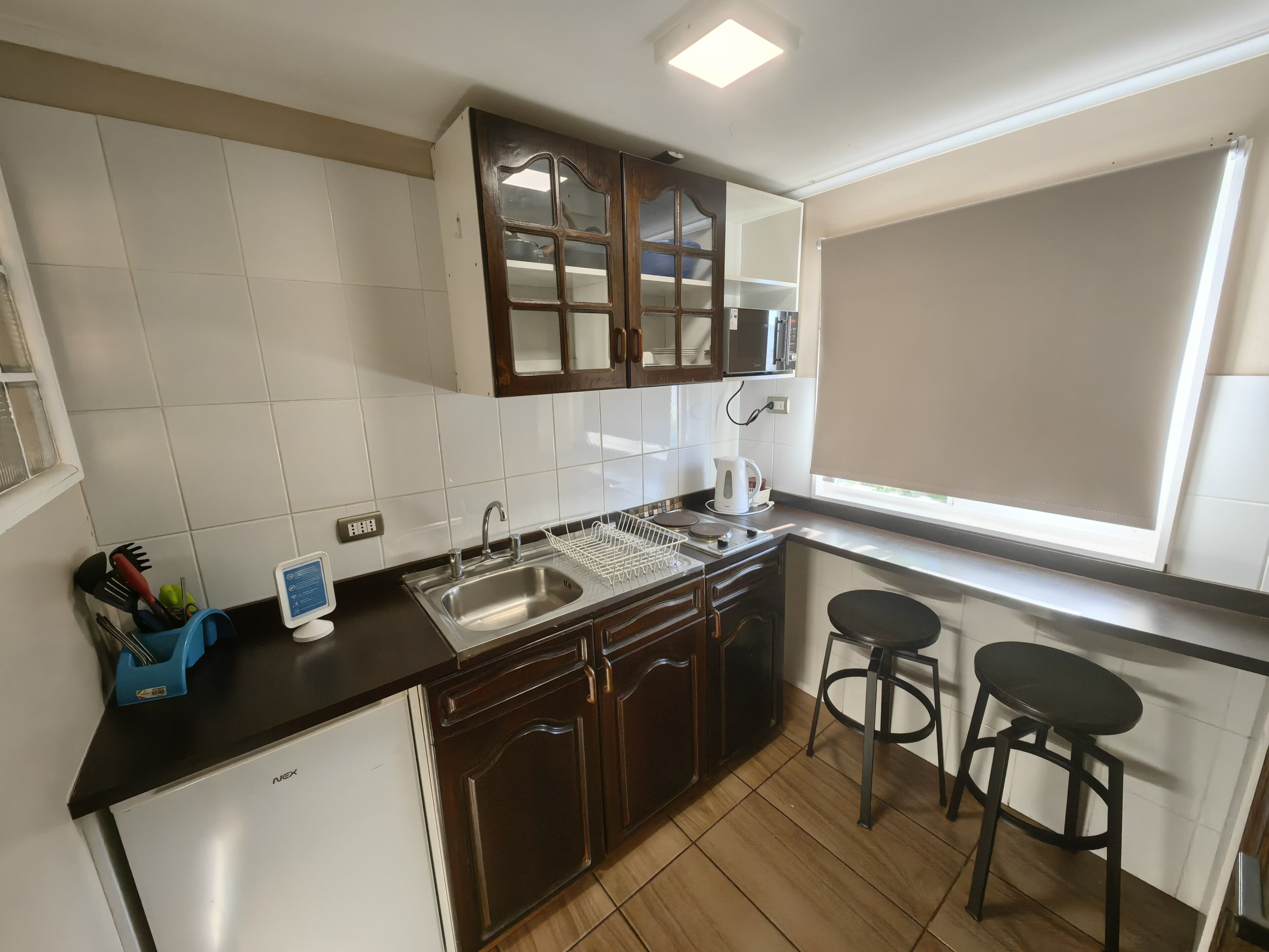 Suite estudio clásica, vista al patio | Cocina privada