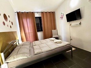 2 habitaciones, cuna de viaje, wifi gratis y ropa de cama 