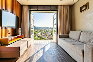 Basic Apartment | Living area | 32-inch Smart TV with cable channels