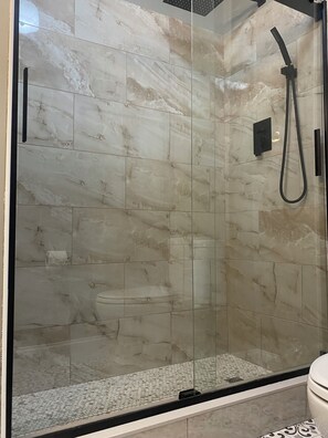 Shower, hair dryer, towels, soap