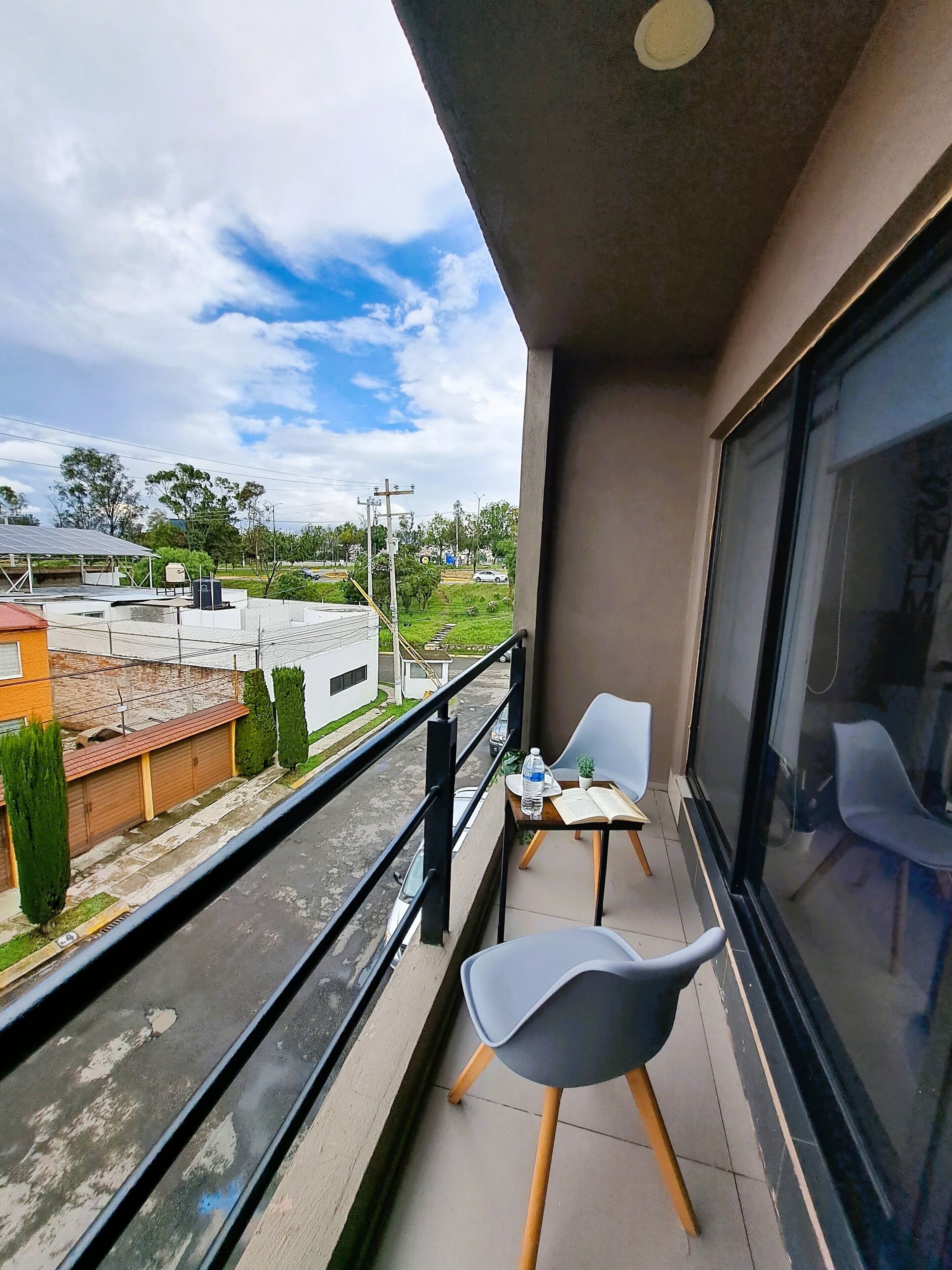 Suite estudio ejecutiva, balcón, vista a la ciudad | Vista del balcón