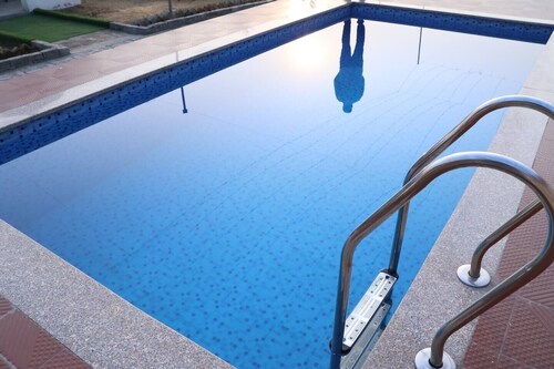 A best farm stay with 2bhk with pool

