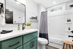 Hair dryer, towels, soap, shampoo