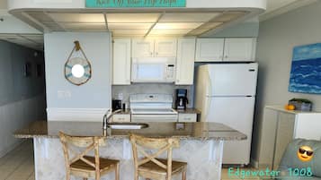 Coffee/tea maker, fridge, microwave, oven