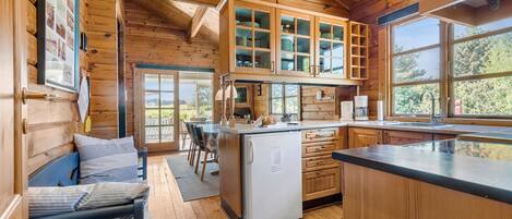 Fridge, stovetop, dishwasher, coffee/tea maker