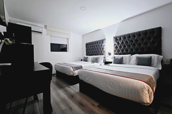 Premium bedding, down duvets, in-room safe, individually furnished