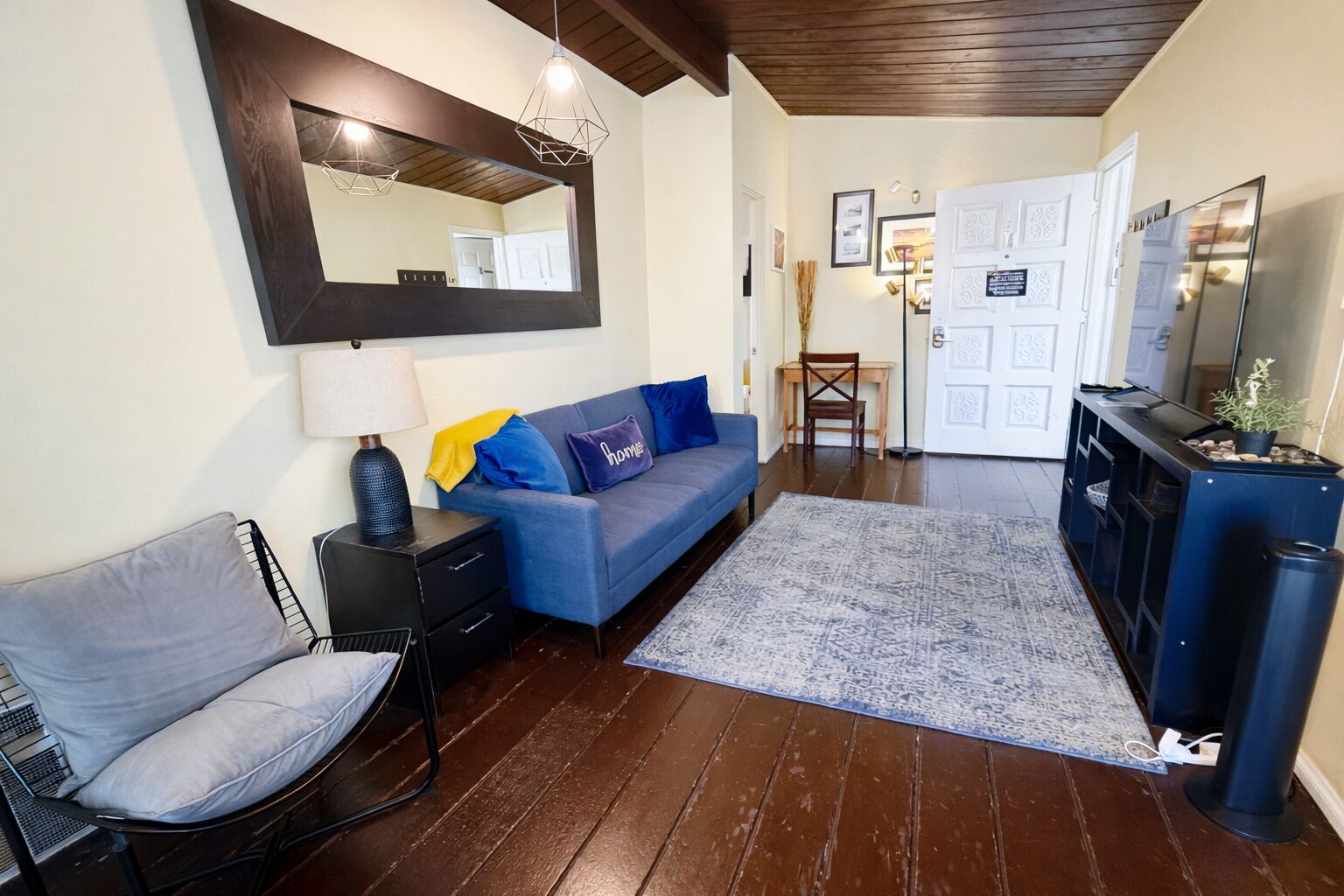 Apartment, Lake View | Living area | Flat-screen TV