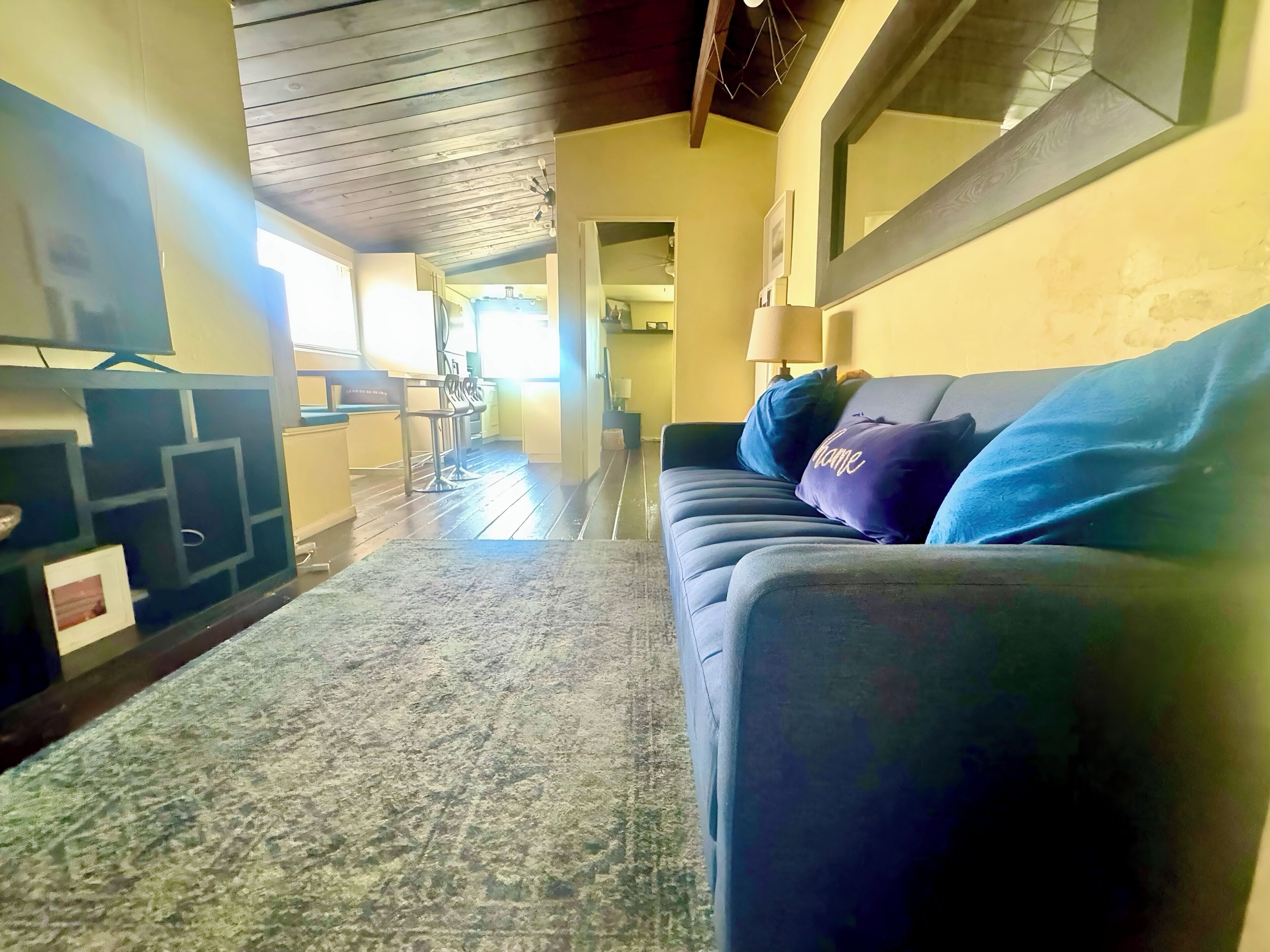 Apartment, Lake View | Living area | Flat-screen TV