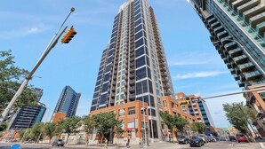 Unclassified image, 3 of 14, button - Heart of Downtown Calgary Luxury Condo with Stunning Views and Premium Amenities (Calgary)