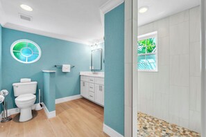 Shower, hair dryer, towels