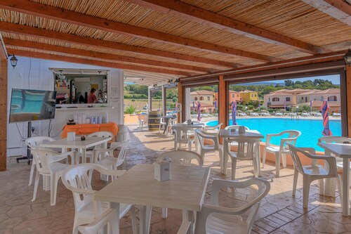 Holiday Home 'Appartamento Residence Mirice' with Shared Pool, Wi-Fi and Air Conditioning