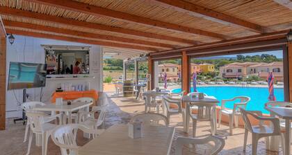 Holiday Home 'Appartamento Residence Mirice' with Shared Pool, Wi-Fi and Air Conditioning