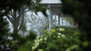 A gazebo with a white roof and columns, surrounded by lush greenery and trees. - Isca House, Exeter, NSW, Isca House, Exeter (Exeter)