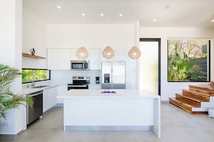 Exclusive Villa | Private kitchen | Full-size fridge, microwave, oven, stovetop