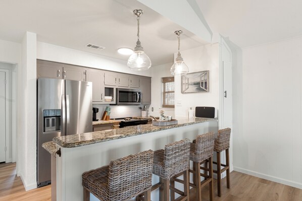 Fridge, microwave, oven, stovetop - Serene Cedar Creek Lake Home! Huge Yard, Firepit, Fish, Kayak, Swim & More! (Gun Barrel City)