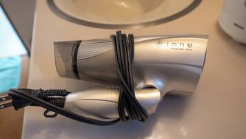 Hair dryer, towels, soap, shampoo