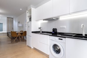Fridge, microwave, stovetop, coffee/tea maker