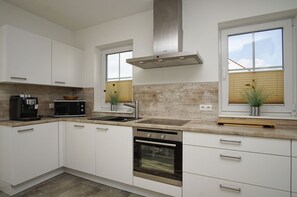 Micro-ondes, four, plaque de cuisson, lave-vaisselle