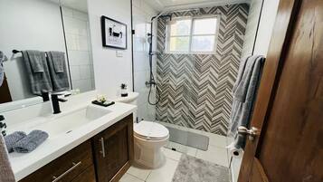 Hair dryer, towels, soap, shampoo