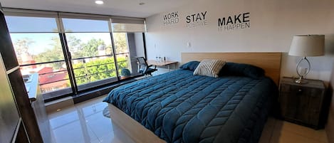 Executive Studio Suite, Balcony, City View | Premium bedding, in-room safe, individually decorated, desk