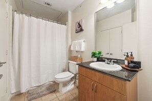 Hair dryer, towels, soap, shampoo